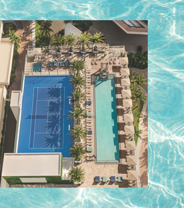 view of pool and court